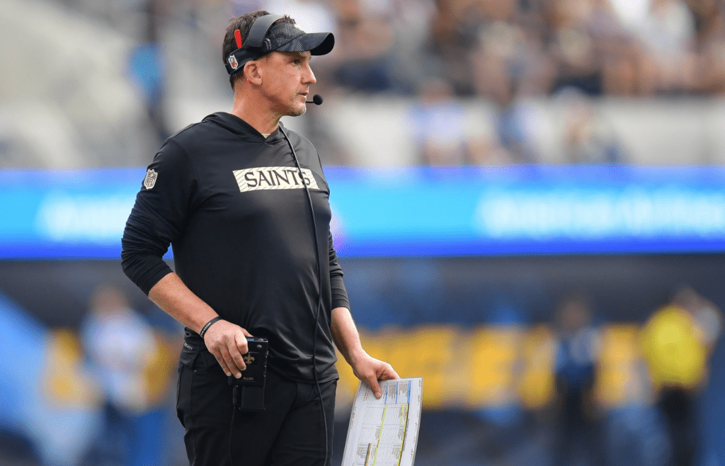 Oct 27, 2024; Inglewood, California, USA; New Orleans Saints head coach Dennis Allen watches game action against the Los Angeles Chargers during the first half at SoFi Stadium. Mandatory Credit: Gary A. Vasquez-Imagn Images