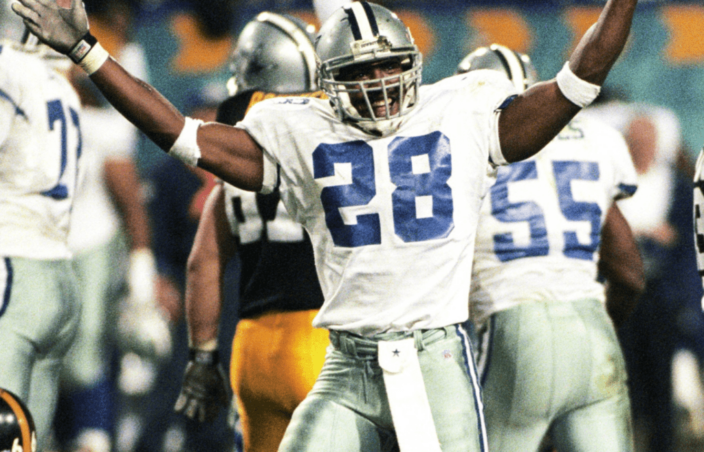Jan 28, 1996; Tempe, AZ, USA; FILE PHOTO; Dallas Cowboys safety Darren Woodson (28) celebrates after a play against the Pittsburgh Steelers during Super Bowl XXX at Sun Devil Stadium. The Cowboys defeated the Steelers 27-17. Mandatory Credit: The Arizona Republic-Imagn Images