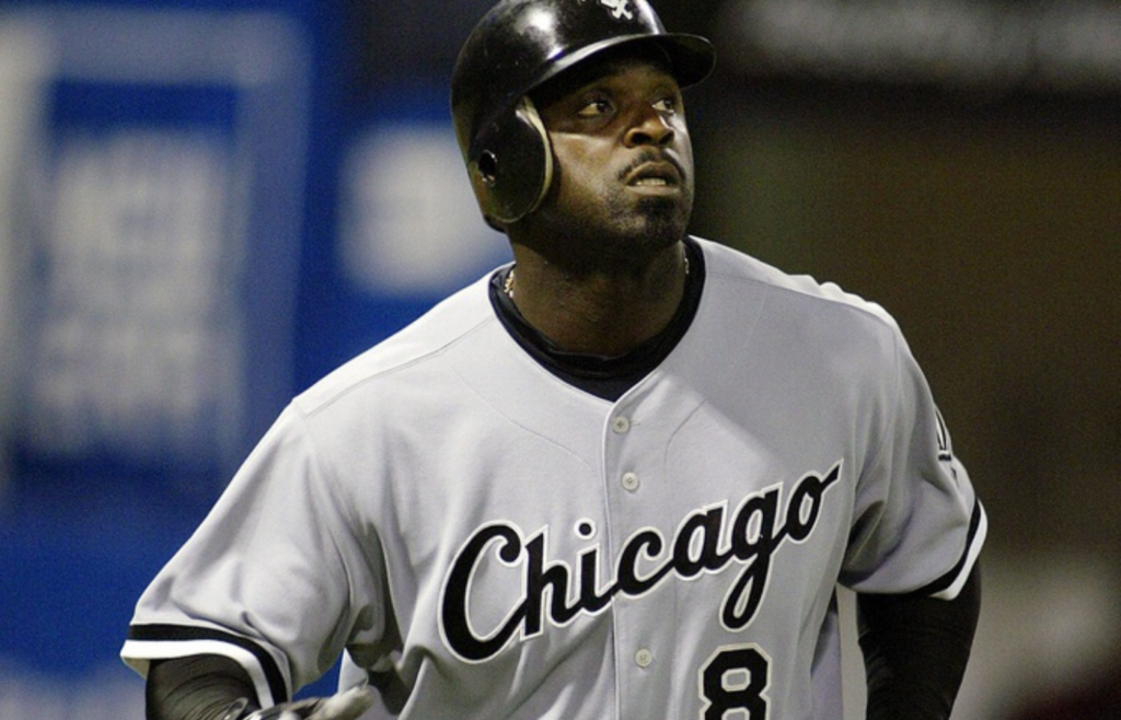 August 24, 2005; Minneapolis, MN, USA; Chicago White Sox designated hitter #8 Carl Everett watches his home run leave the field in the first inning against the Minnesota Twins at the Metrodome. Mandatory Credit: Photo By Bruce Kluckhohn-Imagn Images Copyright (c) 2005 Bruce Kluckhohn