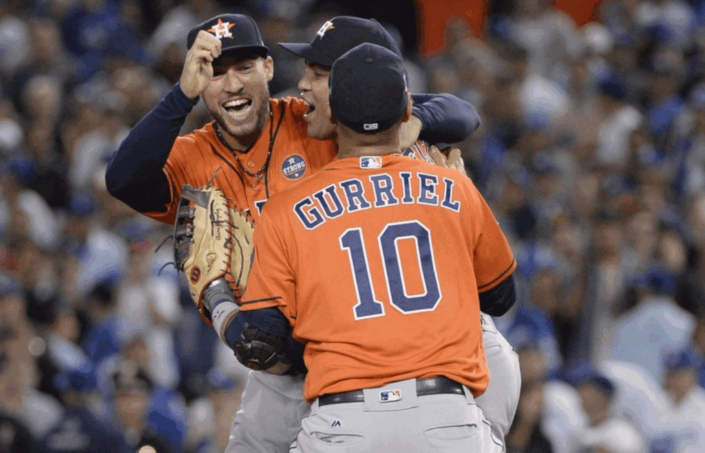 Nov 1, 2017; Los Angeles, CA, USA; Houston Astros players Yuli Gurriel (10) , Carlos Beltran (15) and George Springer (4) celebrate after defeating the Los Angeles Dodgers in game seven of the 2017 World Series at Dodger Stadium. Mandatory Credit: Gary A. Vasquez-Imagn Images