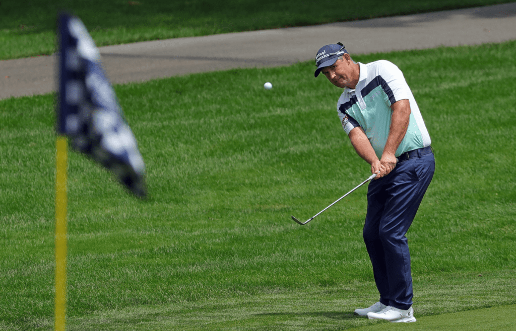 Padraig Harrington of Ireland takes his approach shot onto the No. 6 green during the second round of the 2025 Kaulig Companies Championship at Firestone Country Club, Friday, June 20, 2025, in Akron, Ohio.