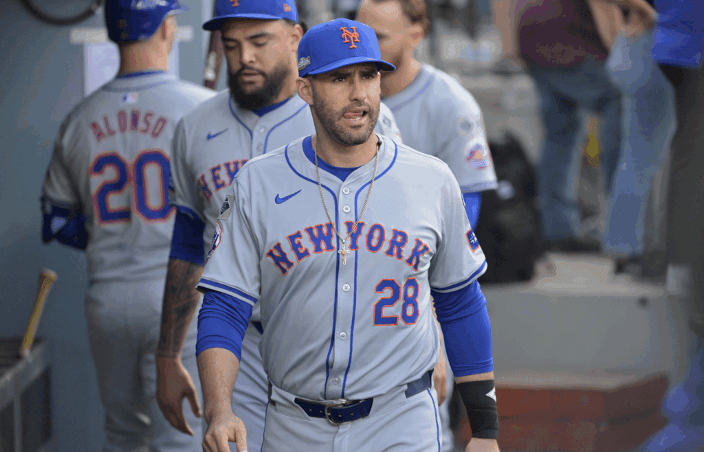 Oct 20, 2024; Los Angeles, California, USA; New York Mets designated hitter J.D. Martinez (28) looks on in the dugout before game six against the Los Angeles Dodgers in the NLCS for the 2024 MLB playoffs at Dodger Stadium. Mandatory Credit: Jayne Kamin-Oncea-Imagn Images