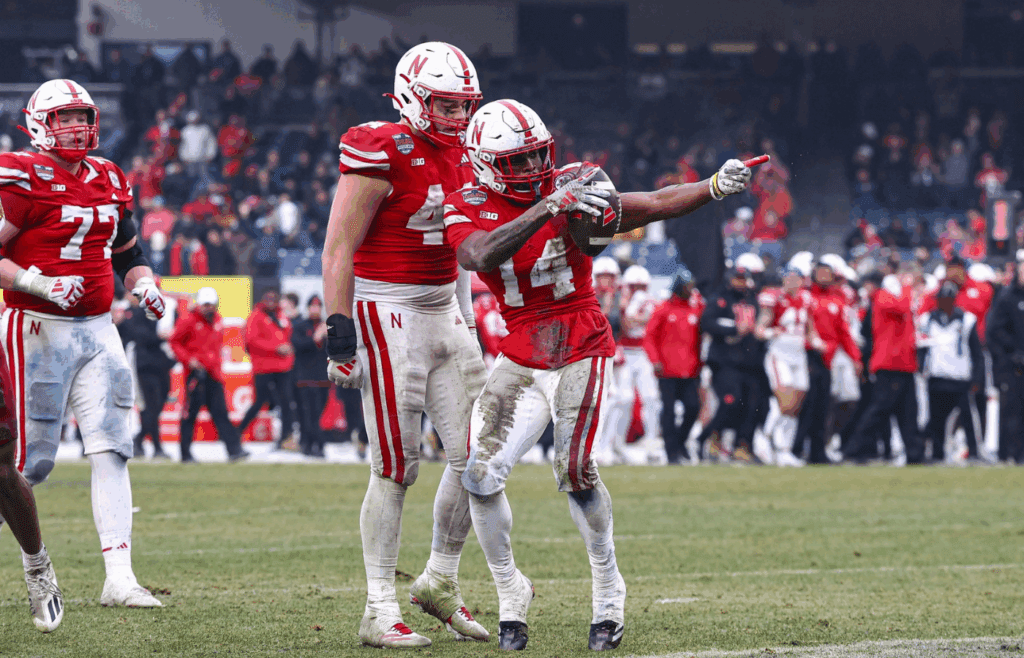 Dec 28, 2024; Bronx, NY, USA; Nebraska Cornhuskers running back Rahmir Johnson (14) celebrates a first down during the first half against the Boston College Eagles at Yankee Stadium. Mandatory Credit: Vincent Carchietta-Imagn Images