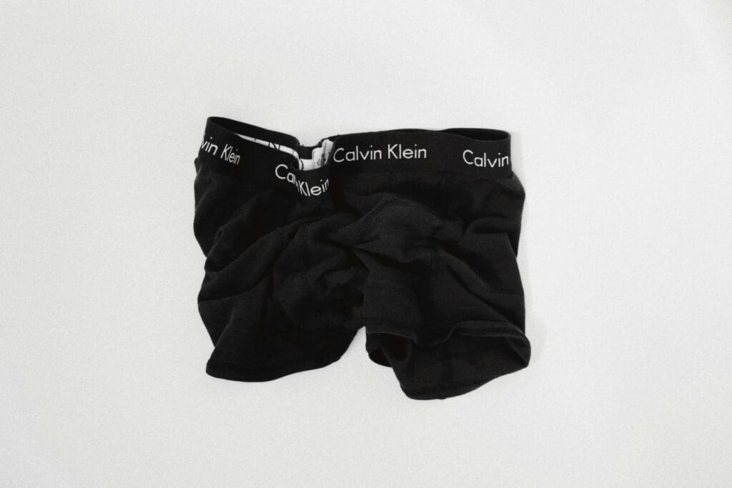 a close up of a pair Calvin Klein of underwear on a white surface