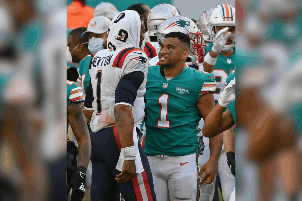 Dec 20, 2020; Miami Gardens, Florida, USA; New England Patriots quarterback Cam Newton (1) and Miami Dolphins quarterback Tua Tagovailoa (1) meet up midfield after the Miami Dolphins defeated the New England Patriots at Hard Rock Stadium. Mandatory Credit: Jasen Vinlove-Imagn Images