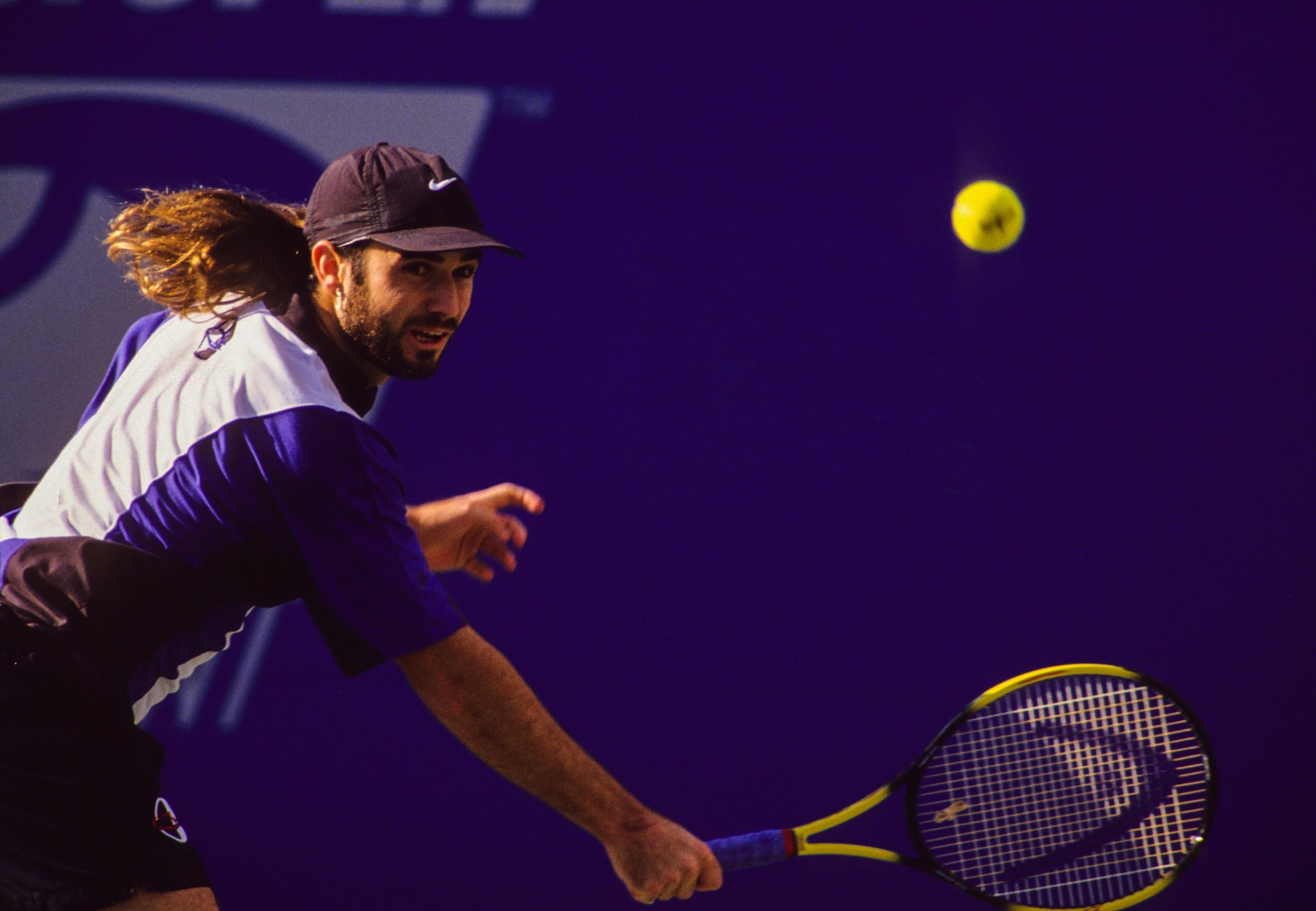Unknown date, 1994; New York City, New York, USA: FILE PHOTO; Andre Agassi (USA) hits a backhand slice during the 1994 US Open at the USTA National Tennis Center. Mandatory Credit: Lou Capozzola-USA TODAY Network