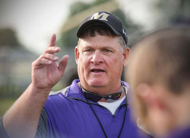 Melrose coach Chuck Noll works with players Wednesday, Aug. 15, during practice.