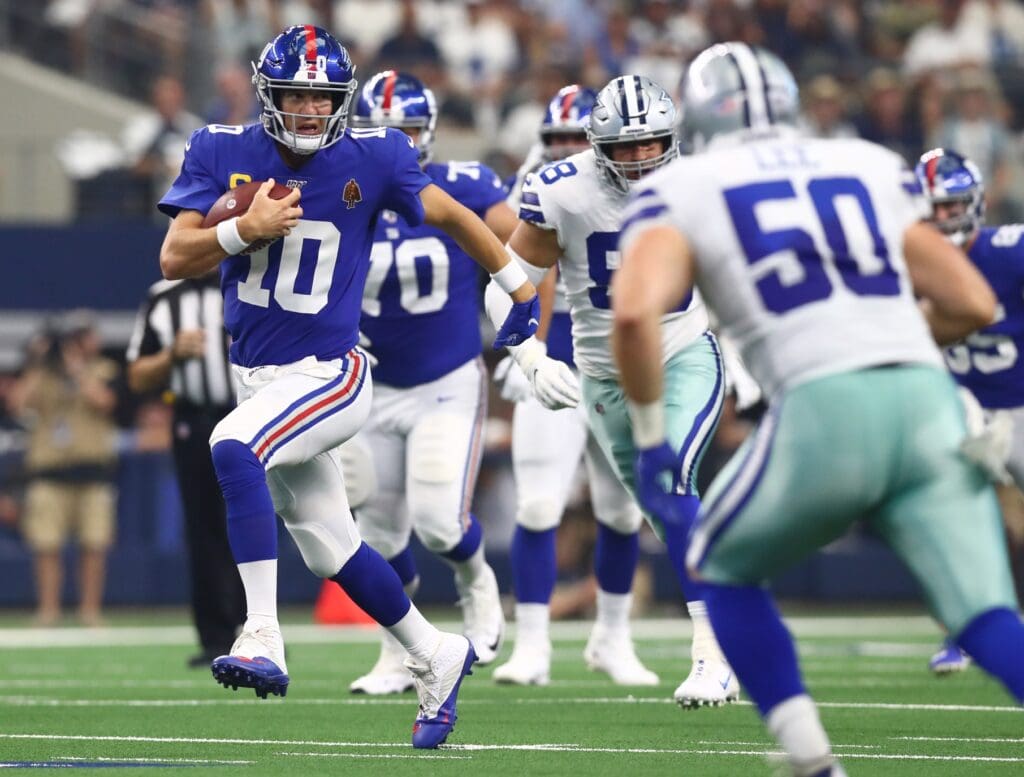 Sep 8, 2019; Arlington, TX, USA; New York Giants quarterback Eli Manning (10) runs with the ball in the first quarter against the Dallas Cowboys at AT&T Stadium. Mandatory Credit: Matthew Emmons-USA TODAY Sports