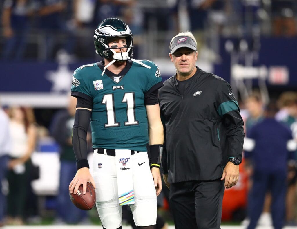 Oct 20, 2019; Arlington, TX, USA; Philadelphia Eagles quarterback Carson Wentz (11) with head coach Doug Pederson prior to the game against the Dallas Cowboys at AT&T Stadium. Mandatory Credit: Matthew Emmons-USA TODAY Sports