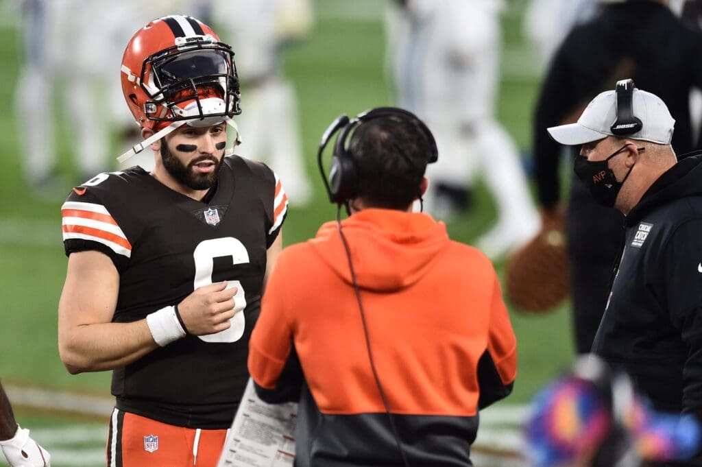 Oct 11, 2020; Cleveland, Ohio, USA; Cleveland Browns quarterback Baker Mayfield (6) talks with head coach Kevin Stefanski and offensive coordinator Alex Van Pelt during the second half against the Indianapolis Colts at FirstEnergy Stadium. Mandatory Credit: Ken Blaze-USA TODAY Sports
