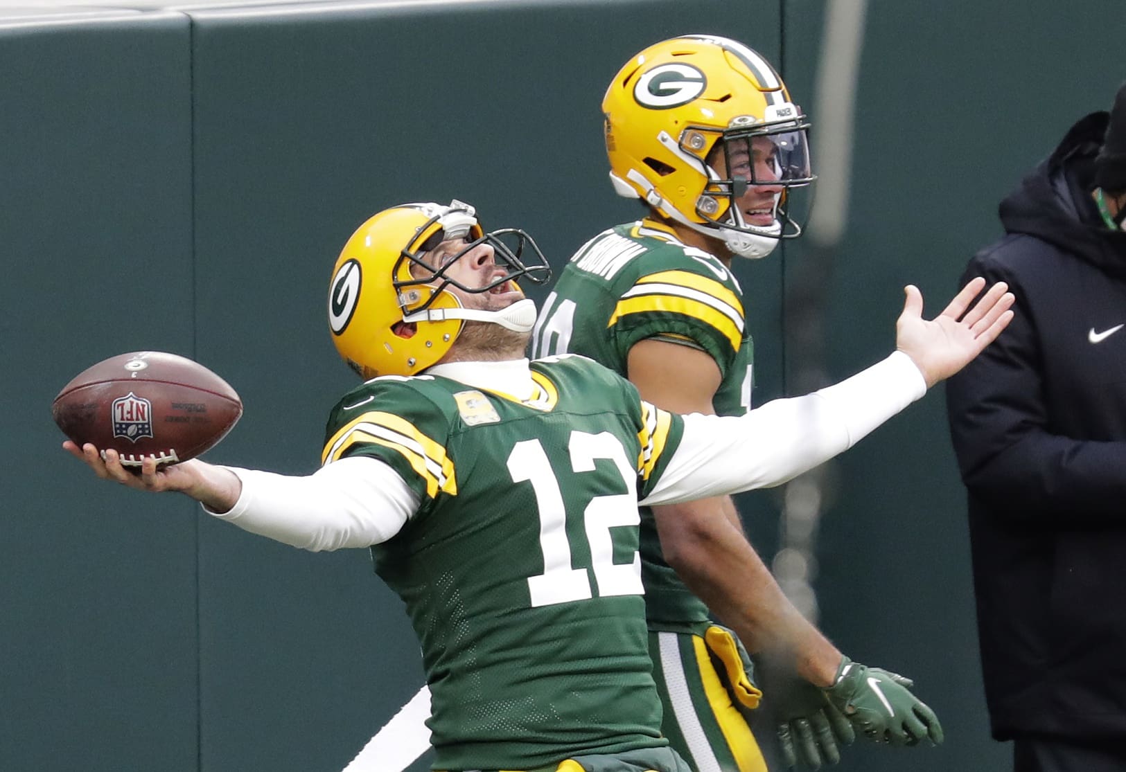 Nov 15, 2020; Green Bay, Wisconsin, USA; Green Bay Packers quarterback Aaron Rodgers (12) celebrates with wide receiver Equanimeous St. Brown (19) after scoring a touchdown against the Jacksonville Jaguars in the second quarter at Lambeau Field. Mandatory Credit: Dan Powers/Appleton Post-Crescent via USA TODAY NETWORK