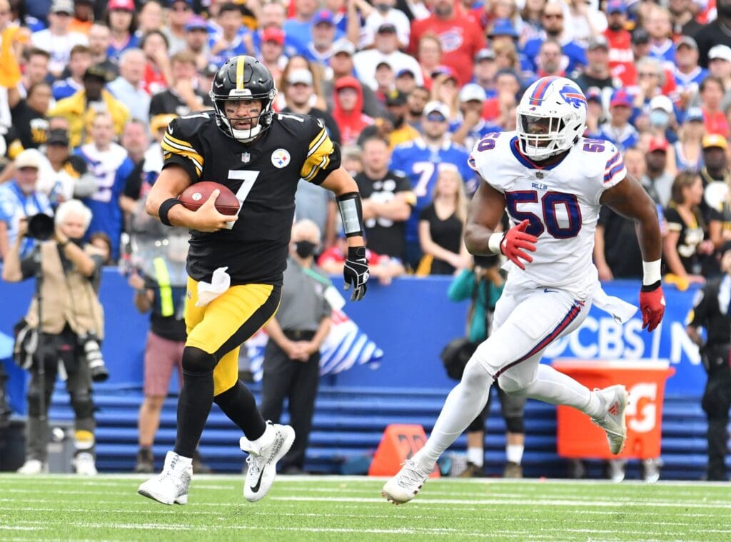 Sep 12, 2021; Orchard Park, New York, USA; Pittsburgh Steelers quarterback Ben Roethlisberger (7) runs past Buffalo Bills defensive end Greg Rousseau (50) in the fourth quarter of a game at Highmark Stadium. Mandatory Credit: Mark Konezny-USA TODAY Sports