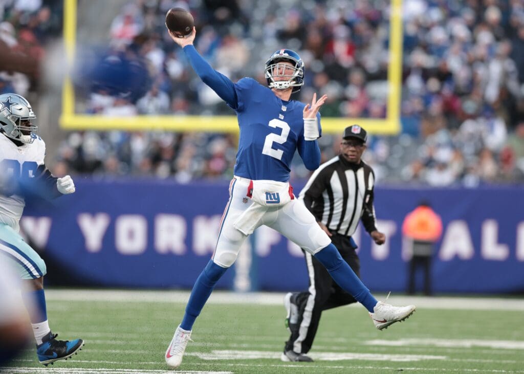 Dec 19, 2021; East Rutherford, New Jersey, USA; New York Giants quarterback Mike Glennon (2) throws the ball against the Dallas Cowboys during the second half at MetLife Stadium. Mandatory Credit: Vincent Carchietta-USA TODAY Sports
