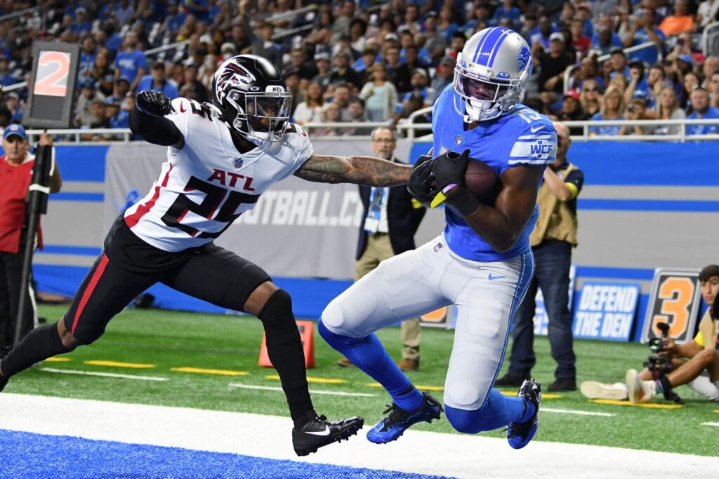 Aug 12, 2022; Detroit, Michigan, USA; Detroit Lions wide receiver Devin Funchess (13) catches a touchdown pass over Atlanta Falcons defensive back Cornell Armstrong (25) in the second quarter at Ford Field. Mandatory Credit: Lon Horwedel-USA TODAY Sports