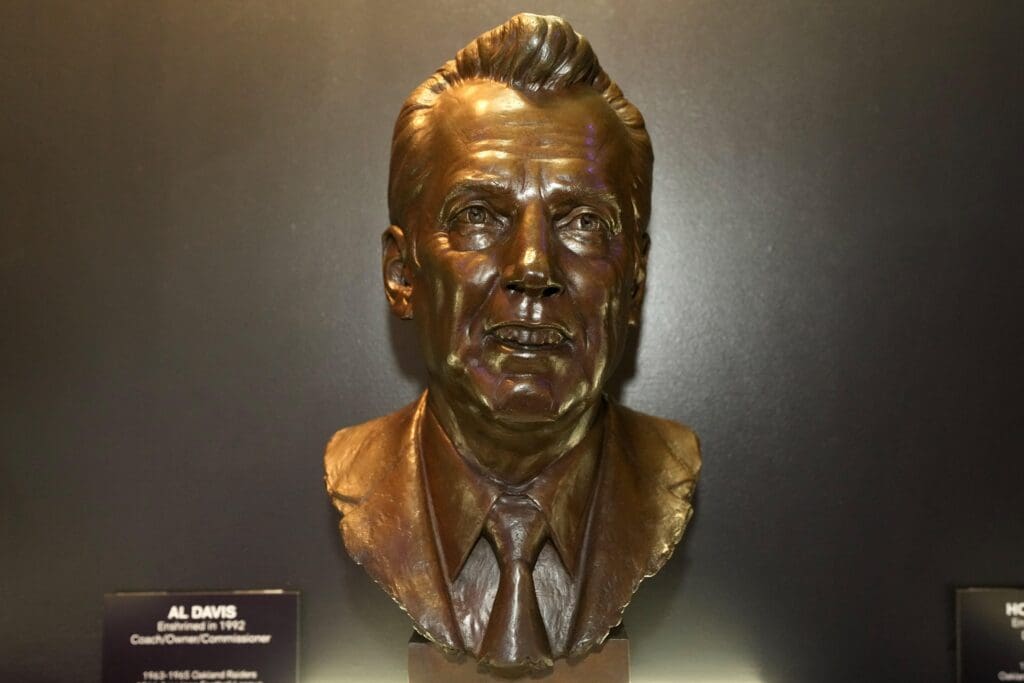 Feb 9, 2024; Las Vegas, NV, USA; The bust of Oakland and Los Angeles Raiders owner Al Davis at the Pro Football Hall of Fame exhibit at the NFL Experience at the Mandalay Bay South Convention Center. Mandatory Credit: Kirby Lee-USA TODAY Sports