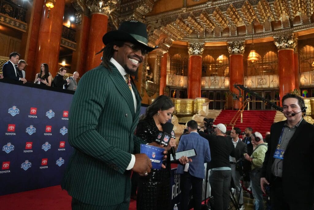 Apr 25, 2024; Detroit, MI, USA; Former NFL quarterback Cam Newton stands on the red carpet ahead of the 2024 NFL Draft at Detroit’s Fox Theatre. Mandatory Credit: Kirby Lee-USA TODAY Sports