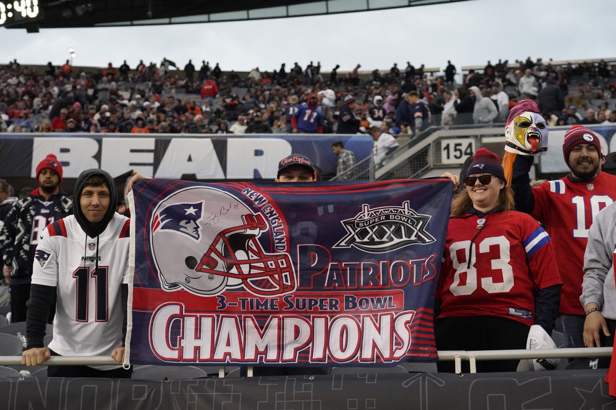 Nov 10, 2024; Chicago, Illinois, USA; New England Patriots fans celebrates the win against the Chicago Bears at Soldier Field. Mandatory Credit: David Banks-Imagn Images