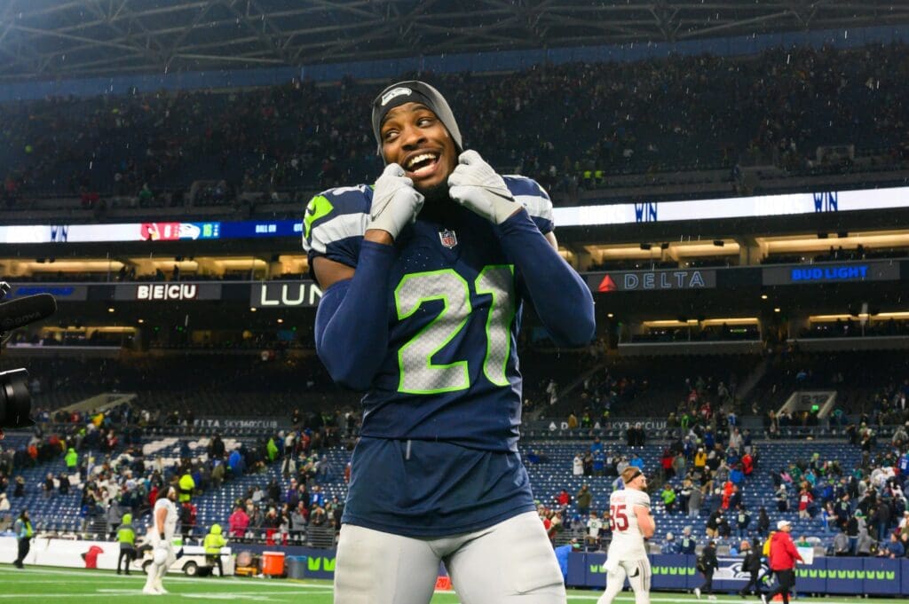 Nov 24, 2024; Seattle, Washington, USA; Seattle Seahawks cornerback Devon Witherspoon (21) walks off the field after the game against the Arizona Cardinals at Lumen Field. Mandatory Credit: Steven Bisig-Imagn Images