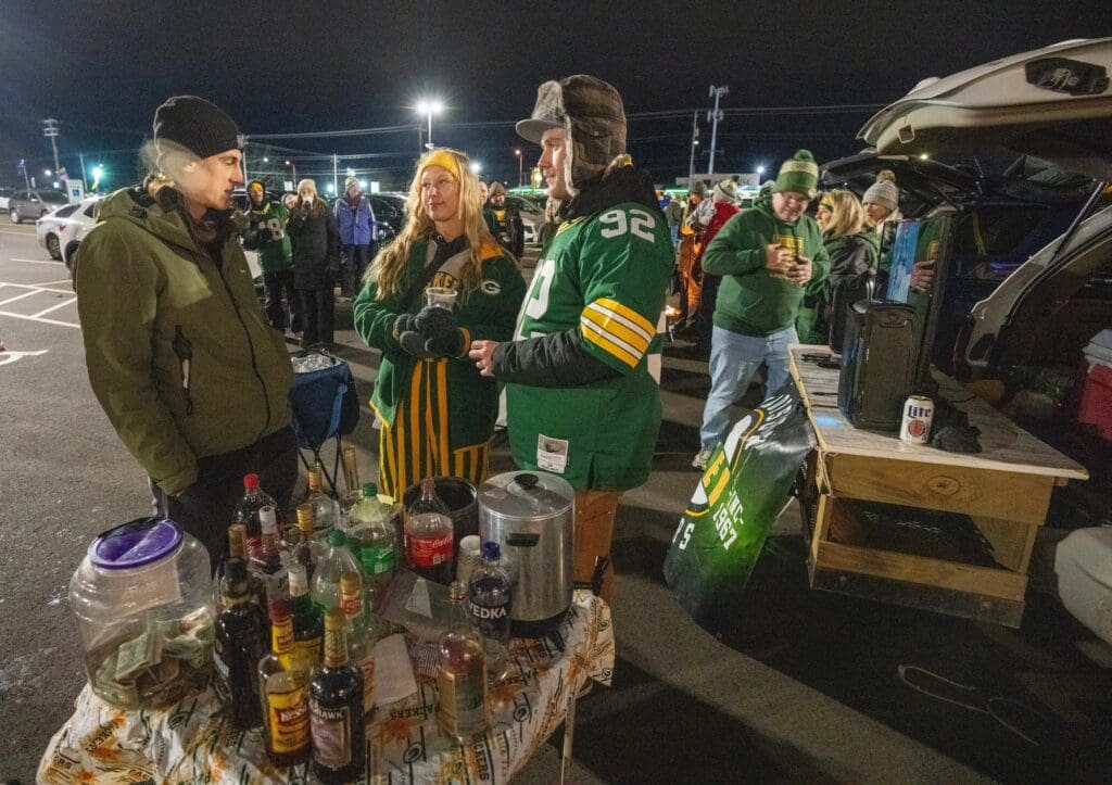 The Madison Packer Backers tailgate before the Green Bay Packers game against the Miami Dolphins Thursday, November 28, 2024 at Lambeau Field in Green Bay, Wisconsin. The club, which has about 400 members, was formed in 1965 and incorporated in 1967.