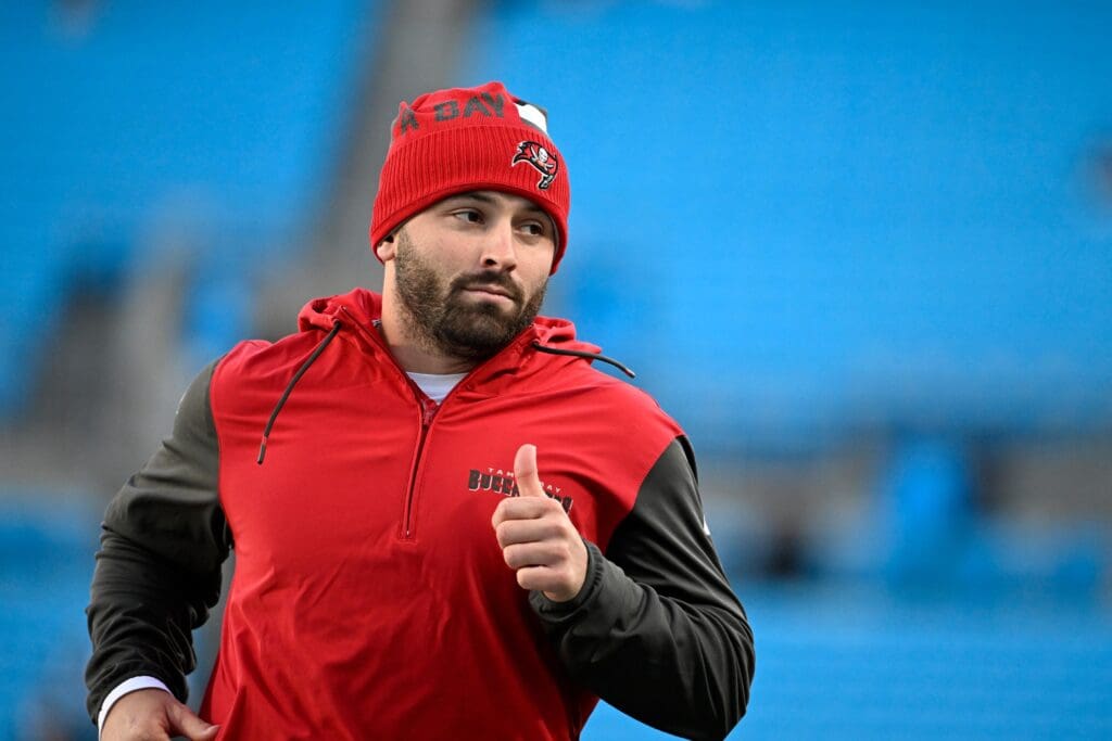 Dec 1, 2024; Charlotte, North Carolina, USA; Tampa Bay Buccaneers quarterback Baker Mayfield (6) runs off the field before the game at Bank of America Stadium. Mandatory Credit: Bob Donnan-Imagn Images