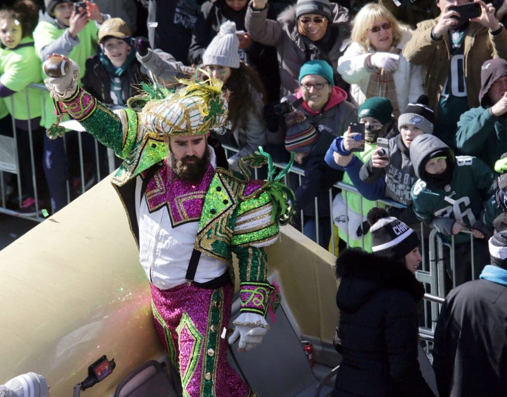 Feb. 8, 2018: Jason Kelce celebrates the Philadelphia Eagles' first Super Bowl championship during a parade down Broad Street to the Philadelphia Museum of Art.