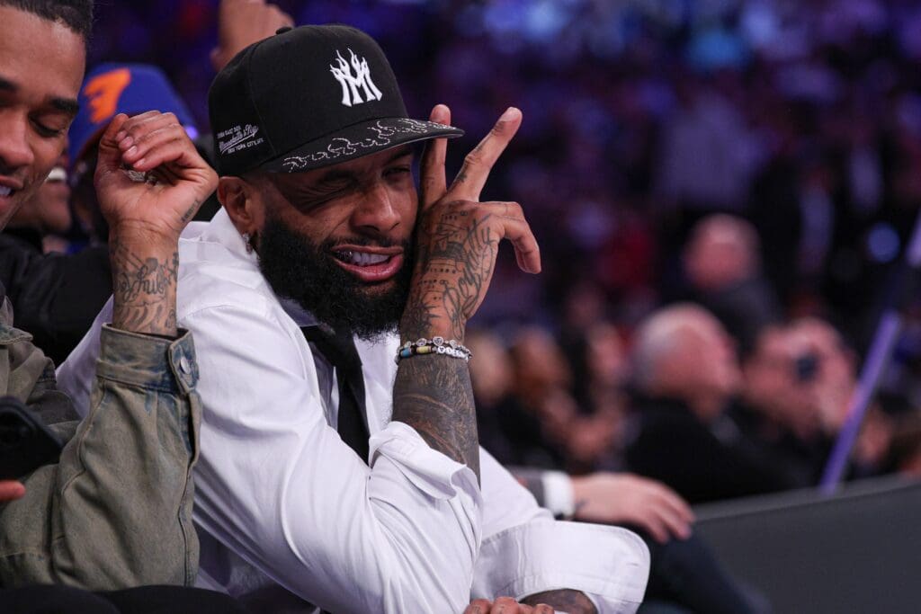 Apr 6, 2025; New York, New York, USA; NFL wide receiver Odell Beckham Jr. sits courtside during the second half of the NBA game between the New York Knicks and the Phoenix Suns at Madison Square Garden. Mandatory Credit: Vincent Carchietta-Imagn Images