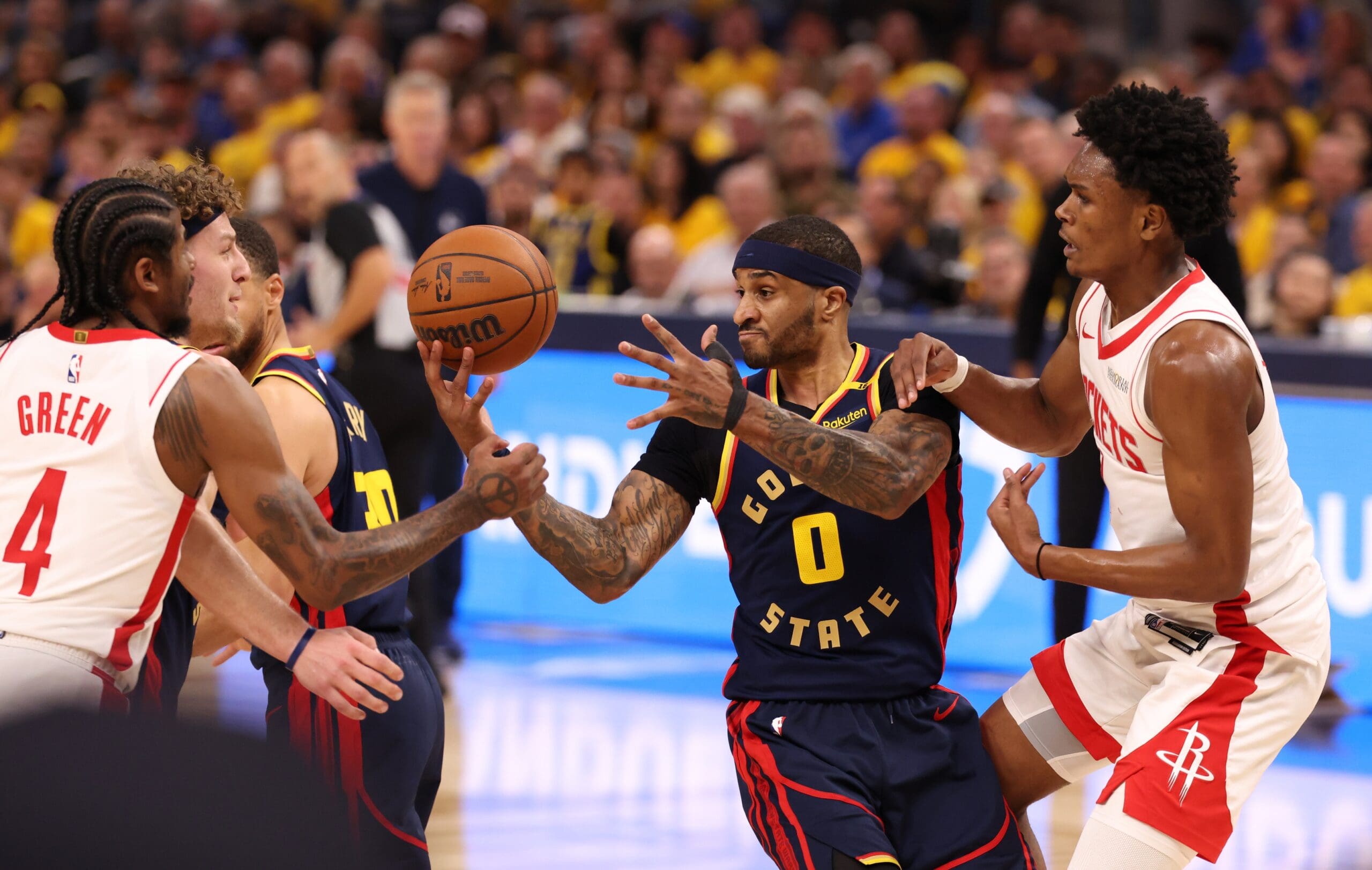 Apr 28, 2025; San Francisco, California, USA; Golden State Warriors guard Gary Payton II (0) controls a rebound between Houston Rockets guard Jalen Green (4) and forward/guard Amen Thompson (1) during the fourth quarter of game four of the 2025 NBA Playoffs first round at Chase Center. Mandatory Credit: Kelley L Cox-Imagn Images