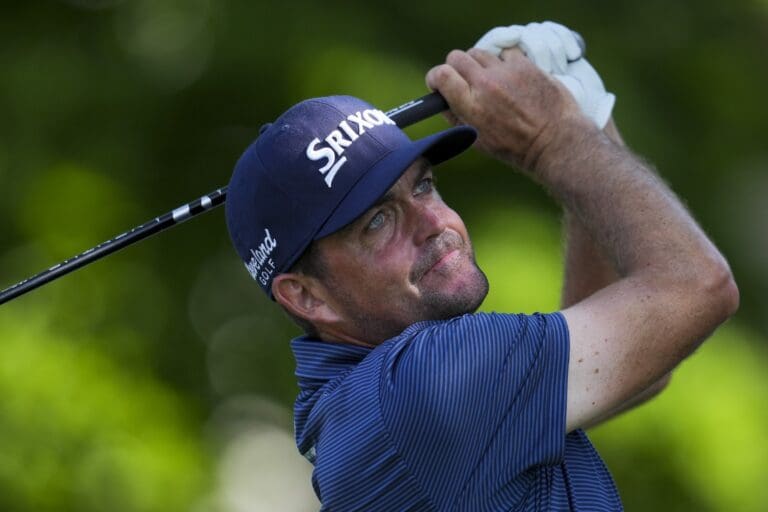 Jun 28, 2025; Detroit, Michigan, USA; Keegan Bradley plays his shot from the 12th tee during the third round of the Rocket Mortgage Classic golf tournament. Mandatory Credit: Aaron Doster-Imagn Images