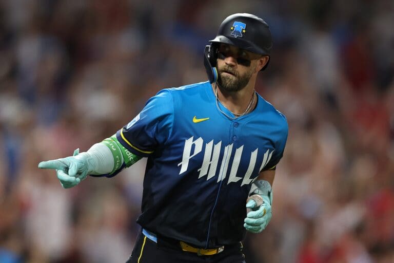 Jul 18, 2025; Philadelphia, Pennsylvania, USA; Philadelphia Phillies first base Bryce Harper (3) points to his dugout after hitting his second home run of the game against the Los Angeles Angels during the eighth inning at Citizens Bank Park. Mandatory Credit: Bill Streicher-Imagn Images