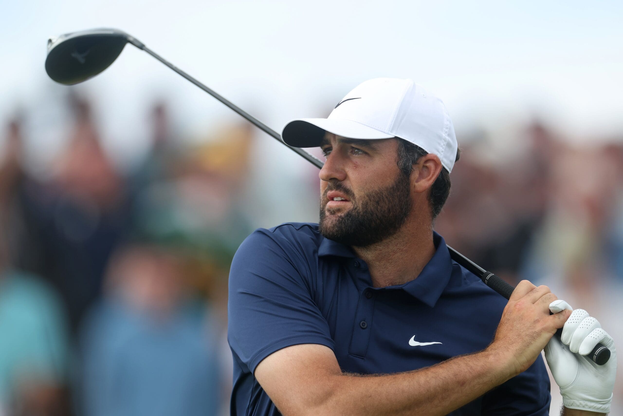 Jul 20, 2025; Portrush, IRL; Scottie Scheffler tees off on the tenth hole during the final round of The 153rd Open Championship golf tournament at Royal Portrush. Mandatory Credit: Mike Frey-Imagn Images