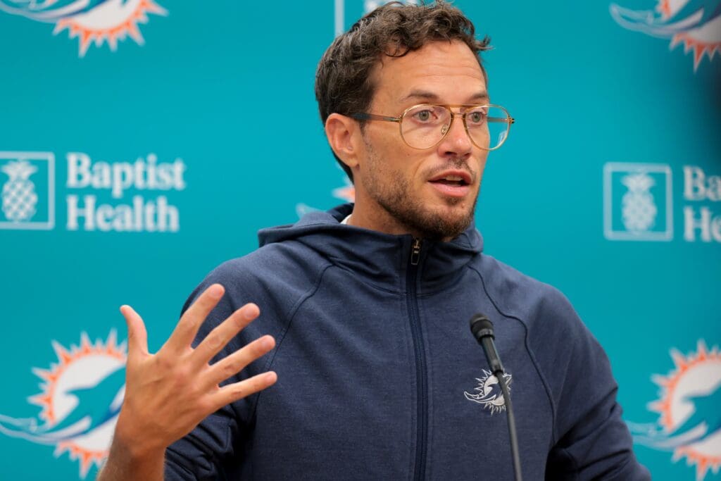 Jul 23, 2025; Miami Gardens, FL, USA; Miami Dolphins head coach Mike McDaniel speaks to reporters during training camp at Baptist Health Training Complex. Mandatory Credit: Sam Navarro-Imagn Images