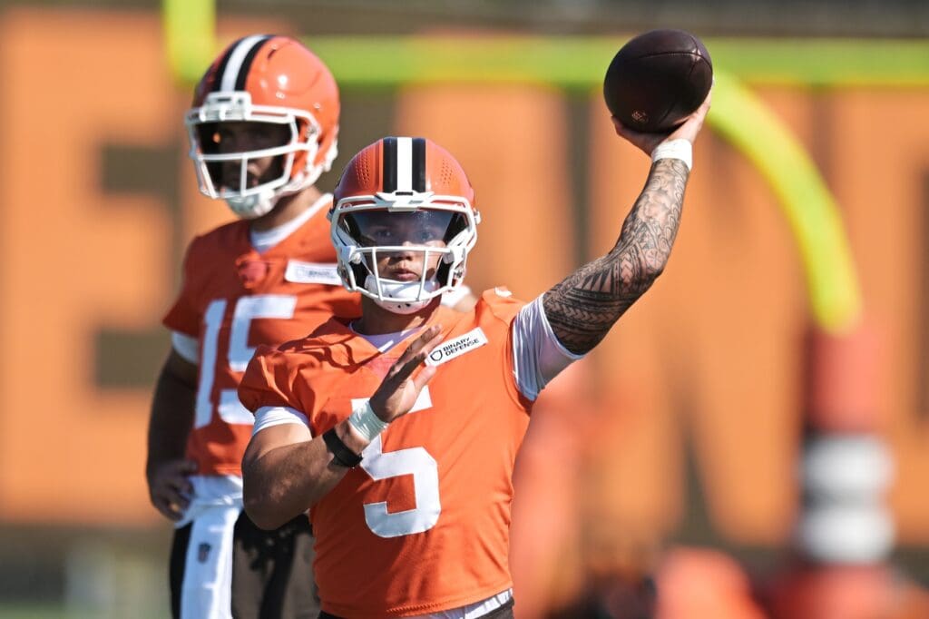 Jul 23, 2025; Berea, OH, USA; Cleveland Browns quarterback Dillon Gabriel (5) throws a pass as quarterback Joe Flacco (15) looks on during training camp at CrossCountry Mortgage Campus. Mandatory Credit: Ken Blaze-Imagn Images