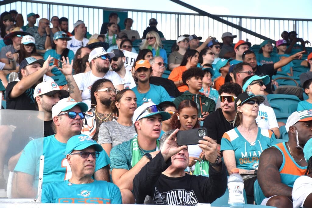 Miami Dolphins fans flock to the team's training field to watch Day 4 of training camp, cheering as players signed autographs and took photos on July 26, 2025.