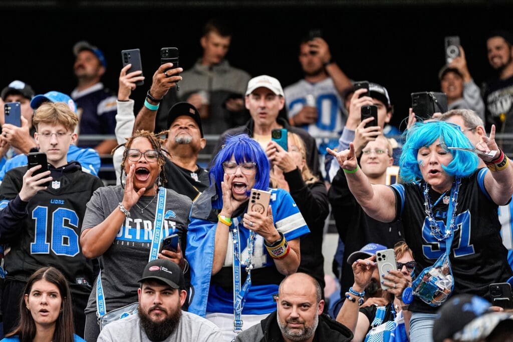 Detroit Lions fans cheer on as players take the field for the first half of the Hall of Fame Game at Tom Benson Hall of Fame Stadium in Canton, Ohio on Thursday, July 31, 2025.