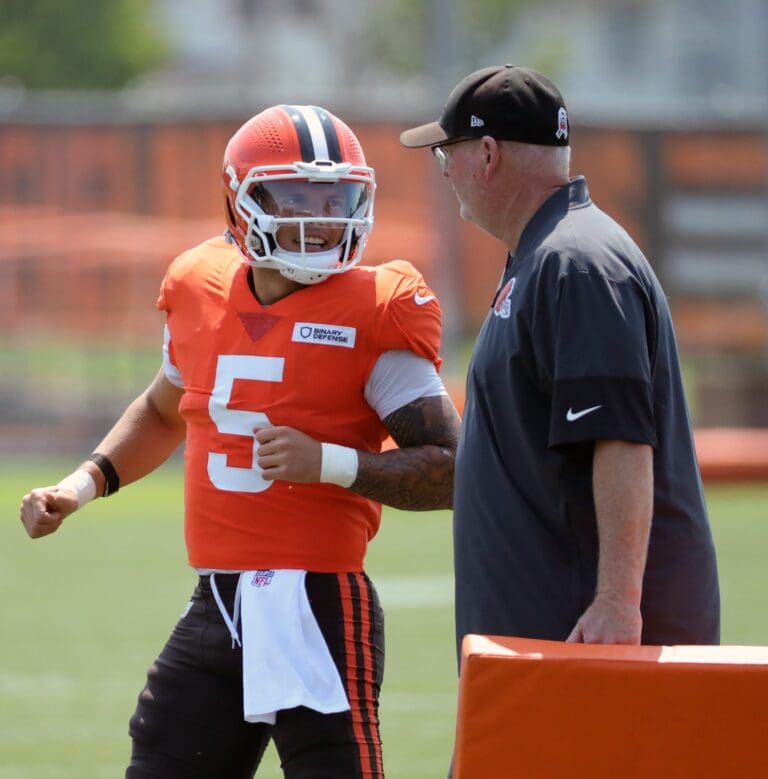 Cleveland Browns quarterback Dillon Gabriel (5) chats with quarterbacks coach Bill Musgrave during NFL training camp at CrossCountry Mortgage Campus, Friday, Aug. 1, 2025, in Berea, Ohio.