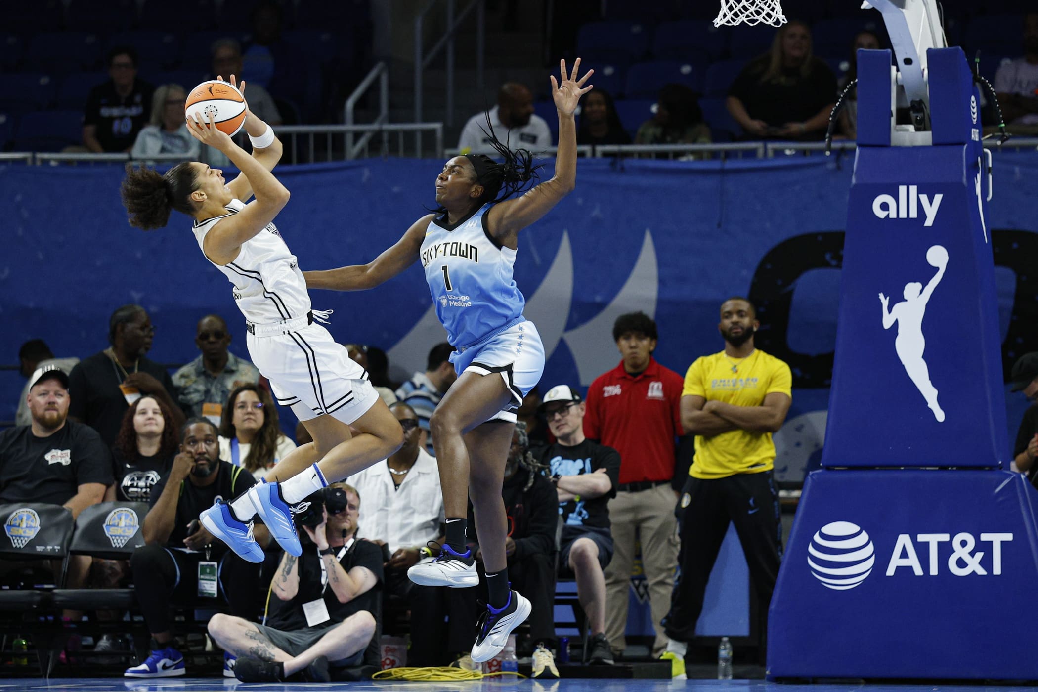 Aug 1, 2025; Chicago, Illinois, USA; Golden State Valkyries forward Janelle Salaun (13) shoots against Chicago Sky center Elizabeth Williams (1) during the first half at Wintrust Arena. Mandatory Credit: Kamil Krzaczynski-Imagn Images