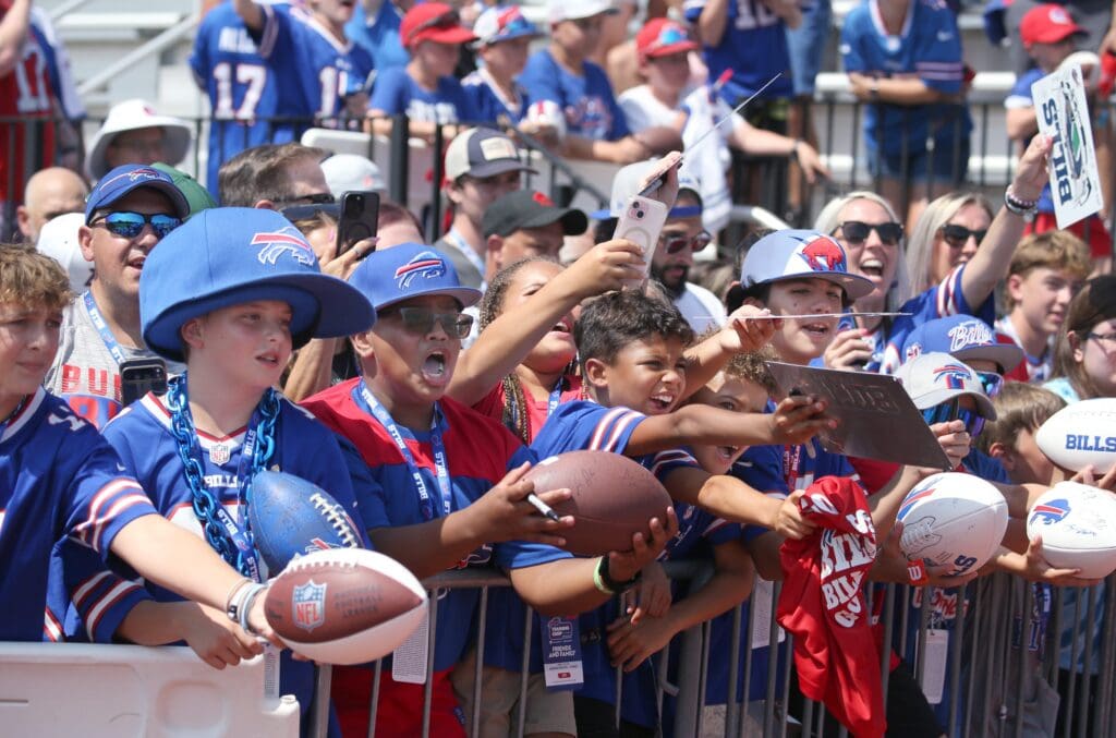Fans scream in hopes of getting an autograph from Bills offensive lineman Dion Dawkins during day five of Buffalo Bills training camp at St. John Fisher University Monday, July 28, 2025 in Pittsford, NY.