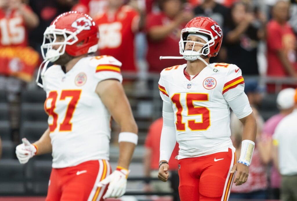 Aug 9, 2025; Glendale, Arizona, USA; Kansas City Chiefs quarterback Patrick Mahomes (15) and tight end Travis Kelce (87) against the Arizona Cardinals during a preseason NFL game at State Farm Stadium. Mandatory Credit: Mark J. Rebilas-Imagn Images