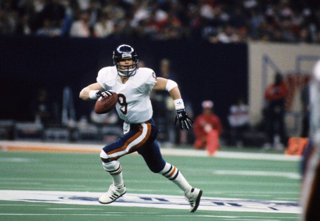 Jan 26, 1986; New Orleans, LA, USA; FILE PHOTO; Chicago Bears quarterback (9) Jim McMahon in action against the New England Patriots during Super Bowl XX at the Superdome. The Bears defeated the Patriots 46-10.  Mandatory Credit: Manny Rubio-USA TODAY Sports