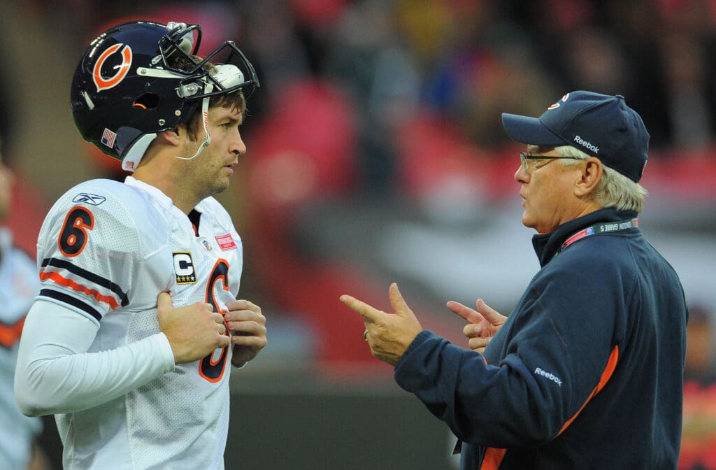 October 23, 2011; London, ENGLAND; Chicago Bears offensive coordinator Mike Martz (right) talks to quarterback Jay Cutler (6) before the NFL International Series game against the Tampa Bay Buccaneers at Wembley Stadium. The Bears defeated the Buccaneers 24-18. Mandatory Credit: Kyle Terada-USA TODAY Sports