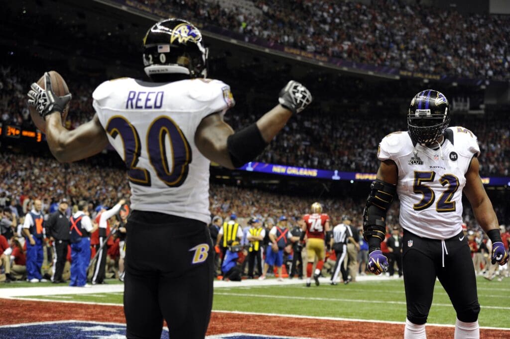 Feb 3, 2013; New Orleans, LA, USA; Baltimore Ravens inside linebacker Ray Lewis (52) celebrates with free safety Ed Reed (20) after the San Francisco 49ers failed to convert on fourth down in the fourth quarter in Super Bowl XLVII at the Mercedes-Benz Superdome. Mandatory Credit: Robert Deutsch-USA TODAY Sports