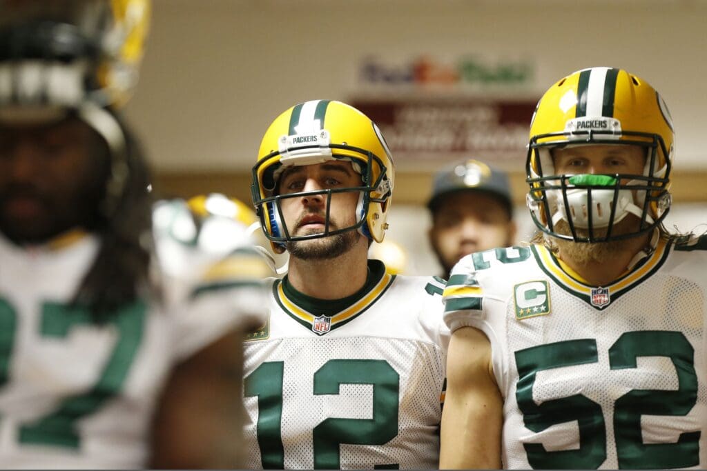 Jan 10, 2016; Landover, MD, USA; Green Bay Packers quarterback Aaron Rodgers (12) and inside linebacker Clay Matthews (52) walks to the field prior to their NFC Wild Card playoff football game against the Washington Redskins at FedEx Field. Mandatory Credit: Geoff Burke-USA TODAY Sports