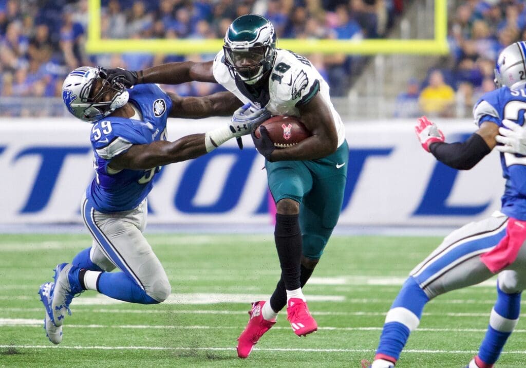 Oct 9, 2016; Detroit, MI, USA; Philadelphia Eagles wide receiver Dorial Green-Beckham (18) stiff arms Detroit Lions outside linebacker Tahir Whitehead (59) during the third quarter at Ford Field. Lions won 24-23. Mandatory Credit: Raj Mehta-USA TODAY Sports