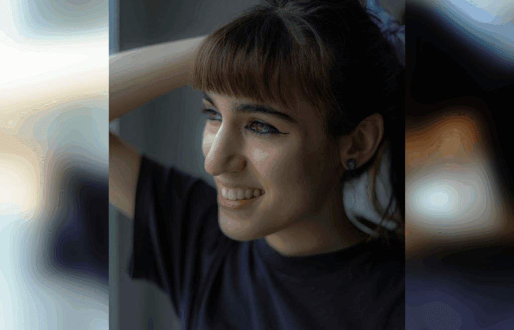 Playful smile and trendy baby bangs look