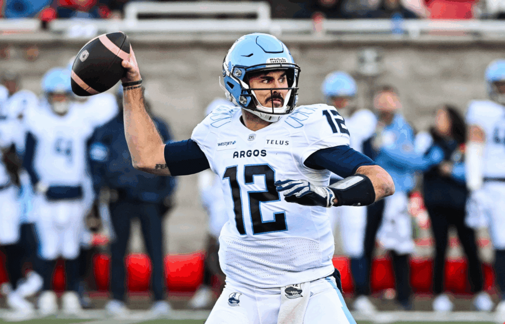 Nov 9, 2024; Montreal, Quebec, CAN; Toronto Argonauts quarterback Chad Kelly (12) passes the ball against the Montreal Alouettes during the first quarter at Percival-Molson Memorial Stadium. Mandatory Credit: David Kirouac-Imagn Images