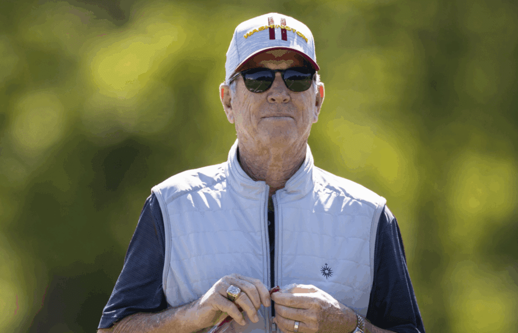 May 15, 2021; Ashburn, Virginia, USA; Former Washington Football Team head coach Norv Turner watches rookie minicamp at Inova Sports Performance Center. Mandatory Credit: Scott Taetsch-Imagn Images