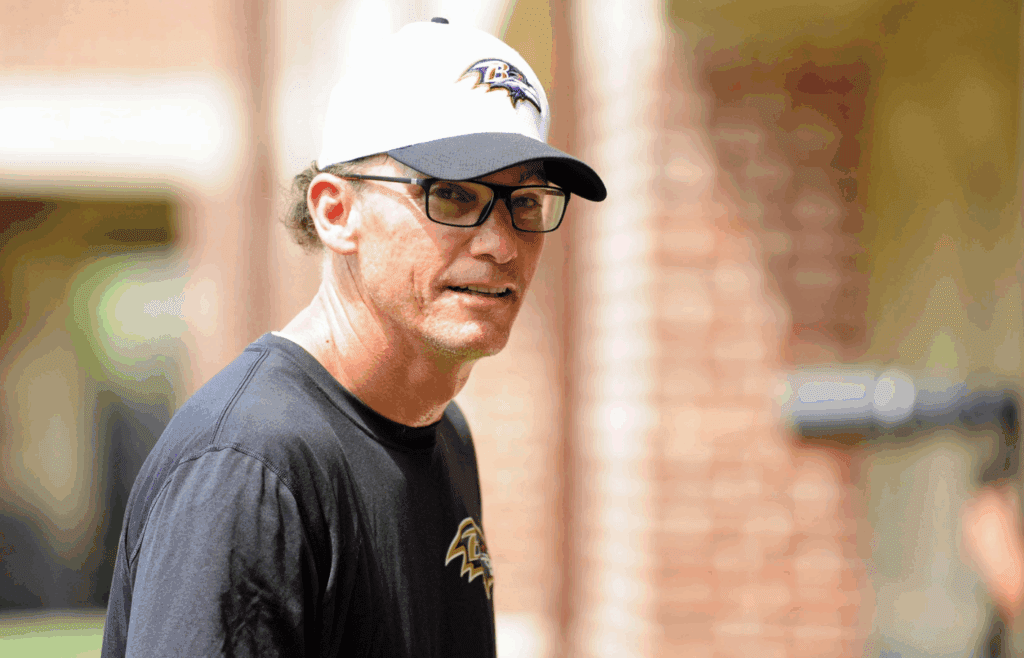 May 28, 2015; Baltimore, MD, USA; Baltimore Ravens offensive coordinator Marc Trestman walks off the field after the OTA at the Under Armour Performance Center. Mandatory Credit: Evan Habeeb-Imagn Images