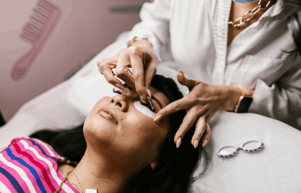 A Woman Putting on Eye Lashes