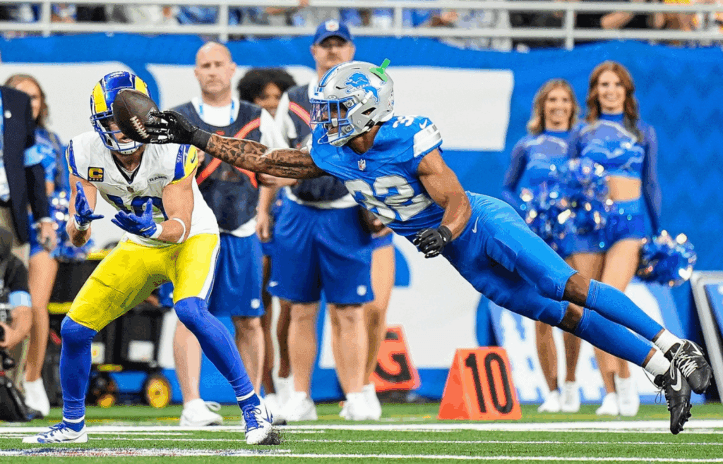Detroit Lions safety Brian Branch (32) breaks a pass intended for Los Angeles Rams wide receiver Cooper Kupp (10) during the first half at Ford Field in Detroit on Sunday, September 8, 2024.