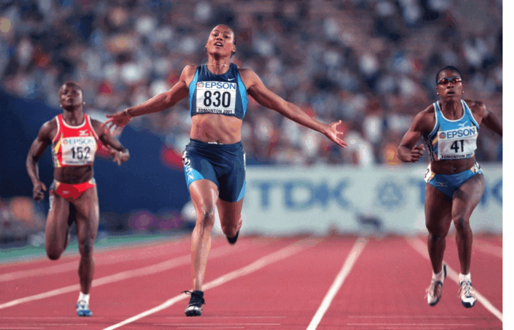 Aug 10, 2001; Edmonton, Alberta, CAN; Marion Jones (USA) wins the 200 meters in the 8th IAAF World Championships in Athletics at Commonwealth Stadium. Mandatory Credit: Kirby Lee/Image of Sport-Imagn Images